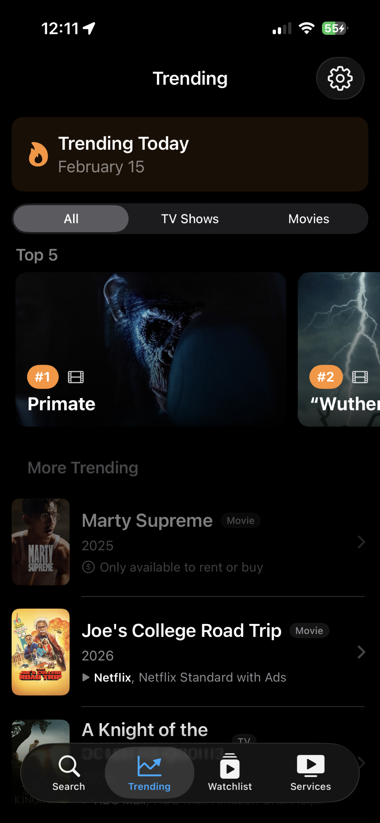 Trending tab showing top movies and TV shows with rankings and streaming availability